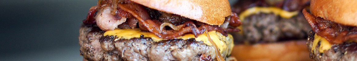Eating Breakfast & Brunch Burger at Zip's Drive-in restaurant in Colville, WA.
